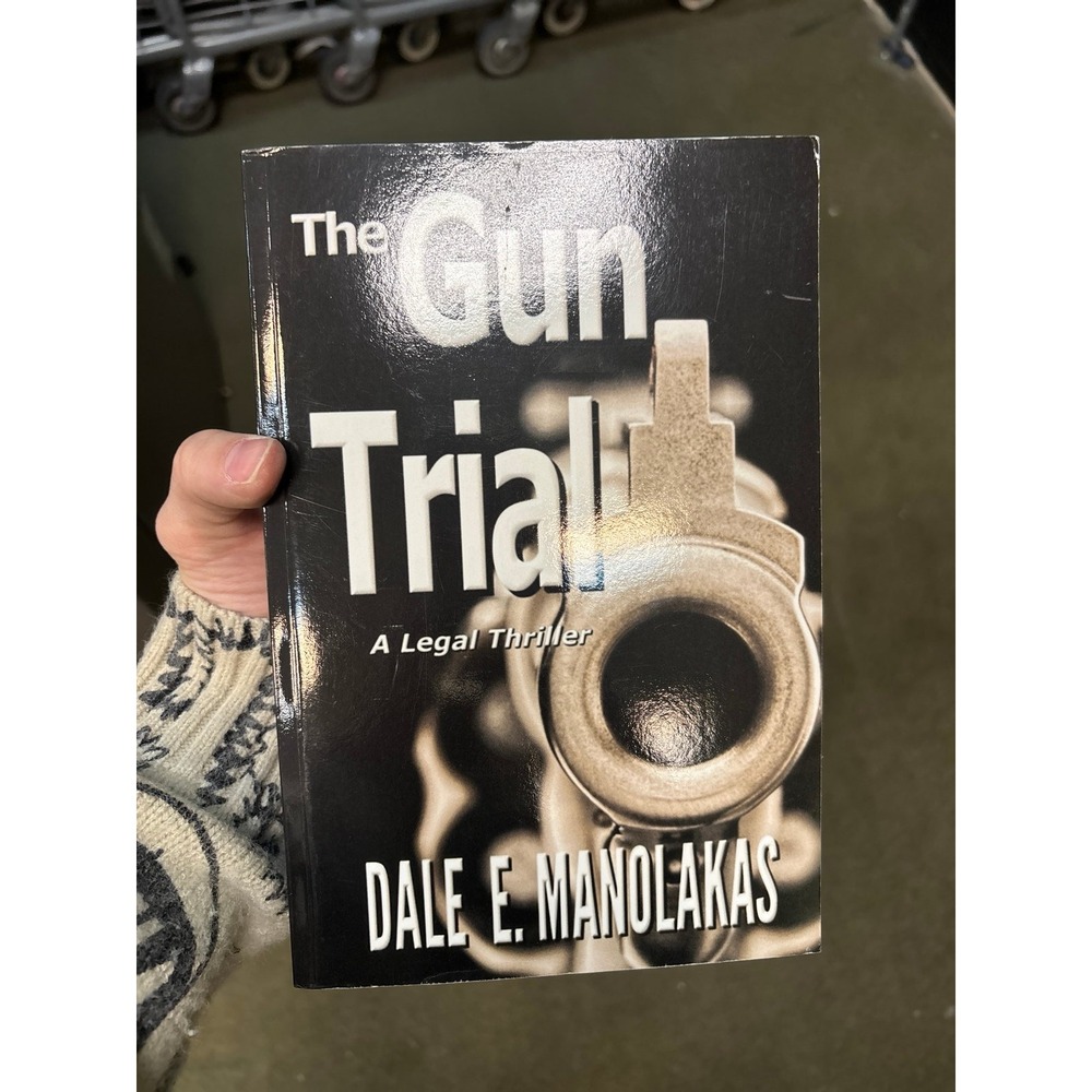The Gun trial A legal‎ thriller by Dale E Manila's book